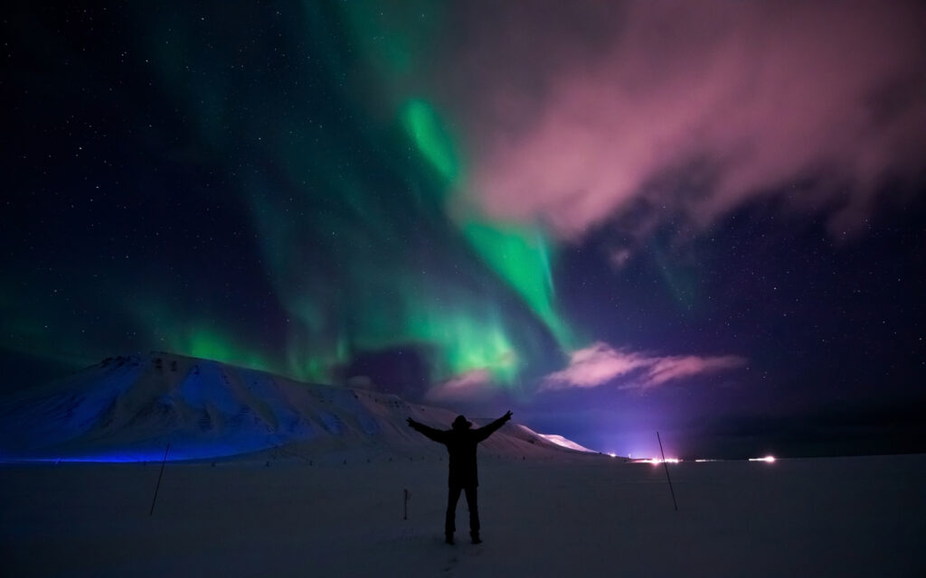 polar northern lights in the mountains of Svalbard