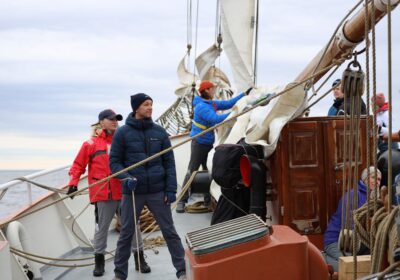 amazone Reizigers op dek tijdens poolreis